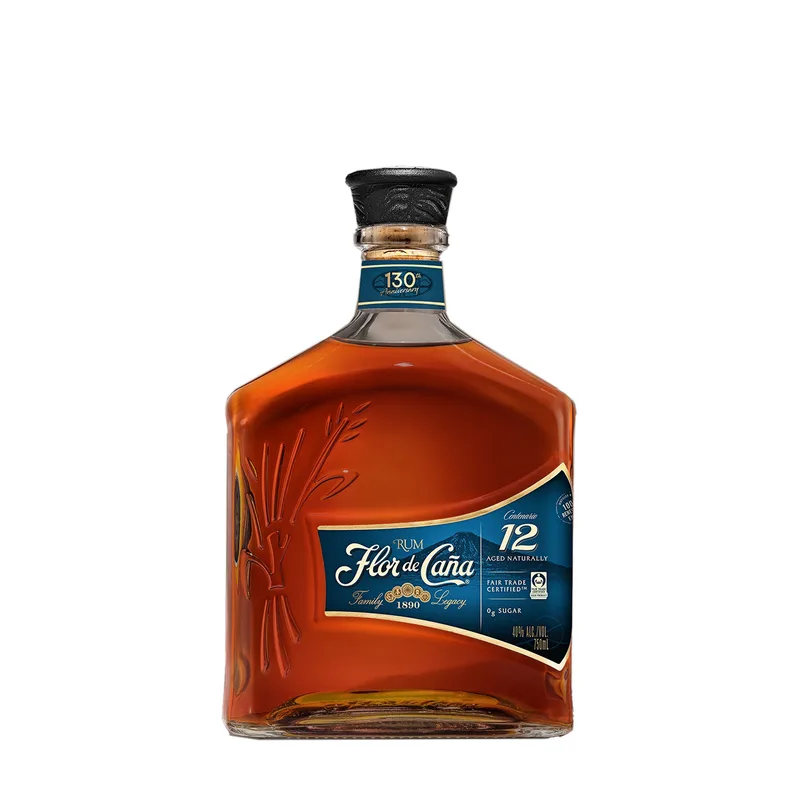 Etched Flor de Caña 12 Year Centenario Rum Liquor Bottle