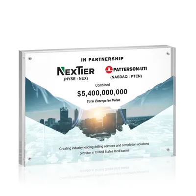 Clear acrylic block printed in color with two company logos and a combined deal value