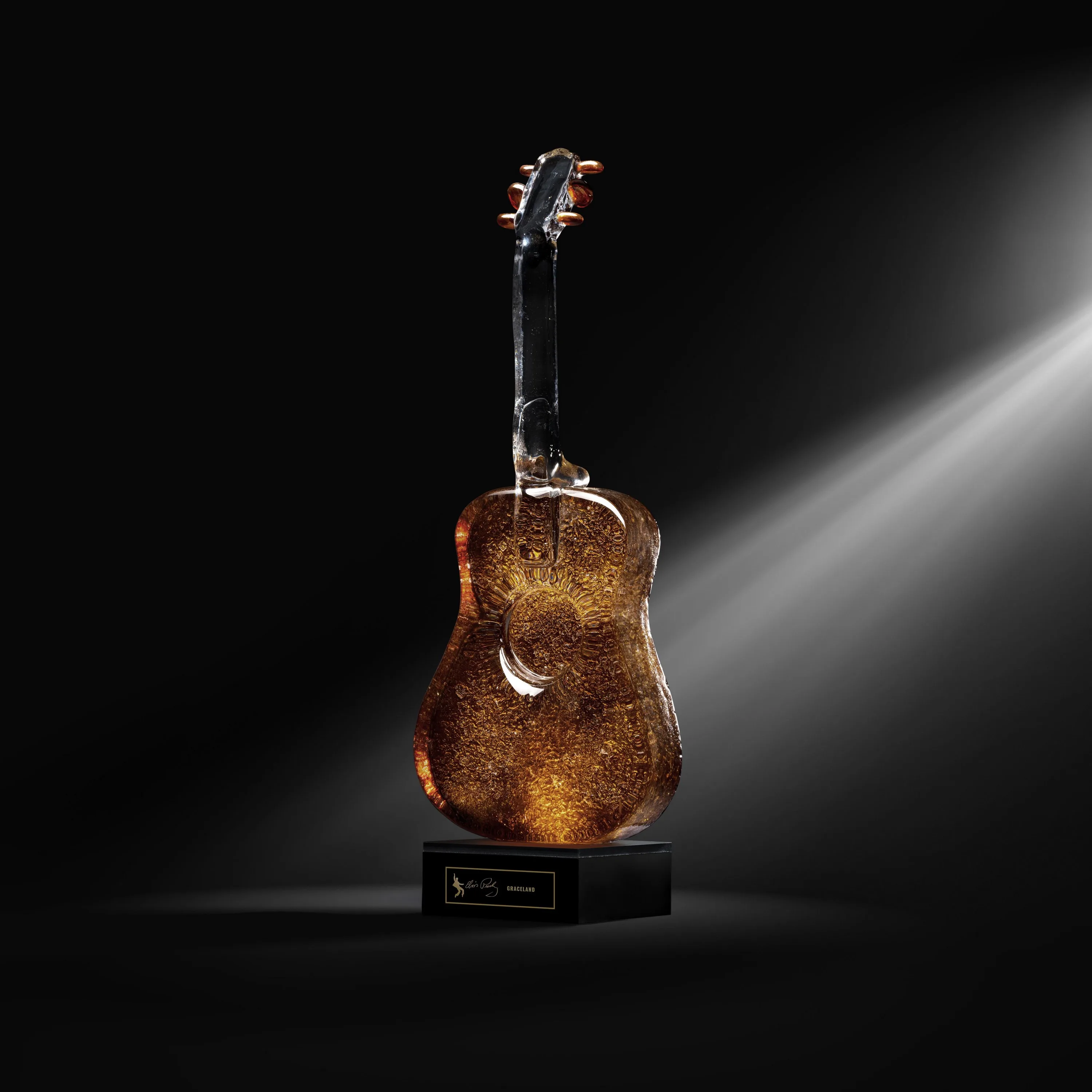 Kosta Boda Elvis P Guitar Graceland Bronze